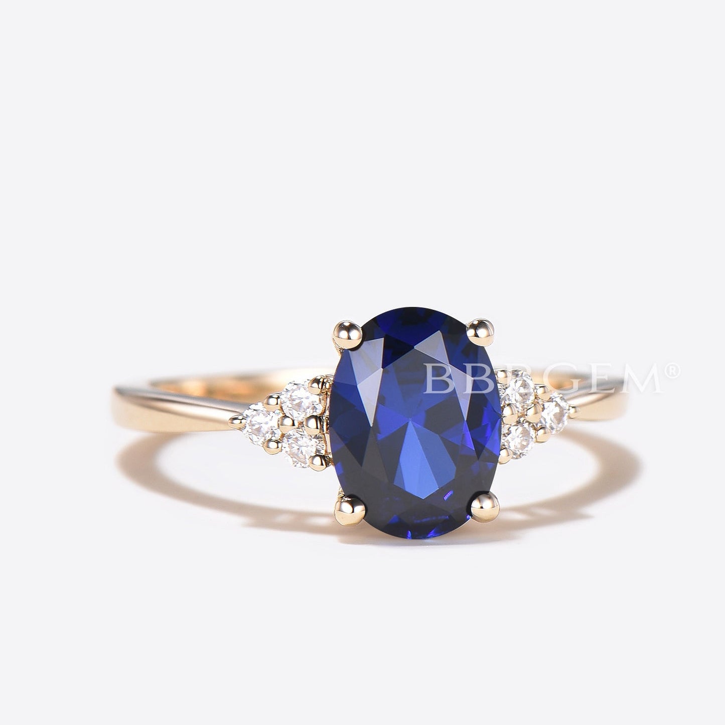 Yellow Gold Lab Created Sapphire Three Stone Moissanite Ring with 6x8mm Blue Oval Lab Sapphire