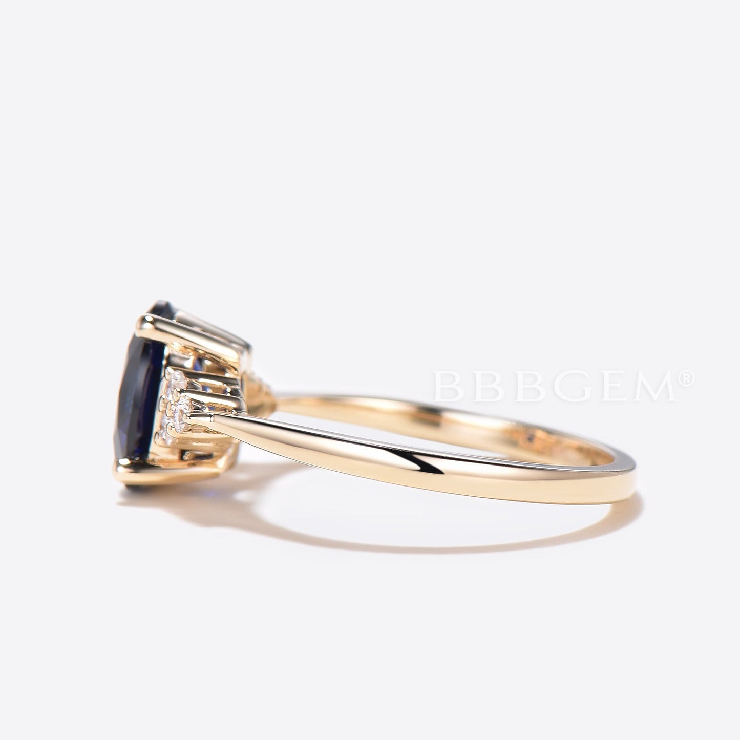 Yellow Gold Lab Created Sapphire Three Stone Moissanite Ring with 6x8mm Blue Oval Lab Sapphire
