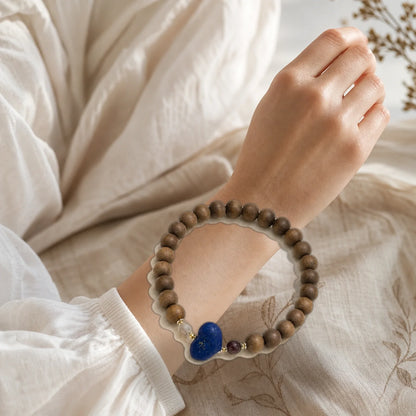 Kynam agarwood blue lapis accent bracelet worn on wrist