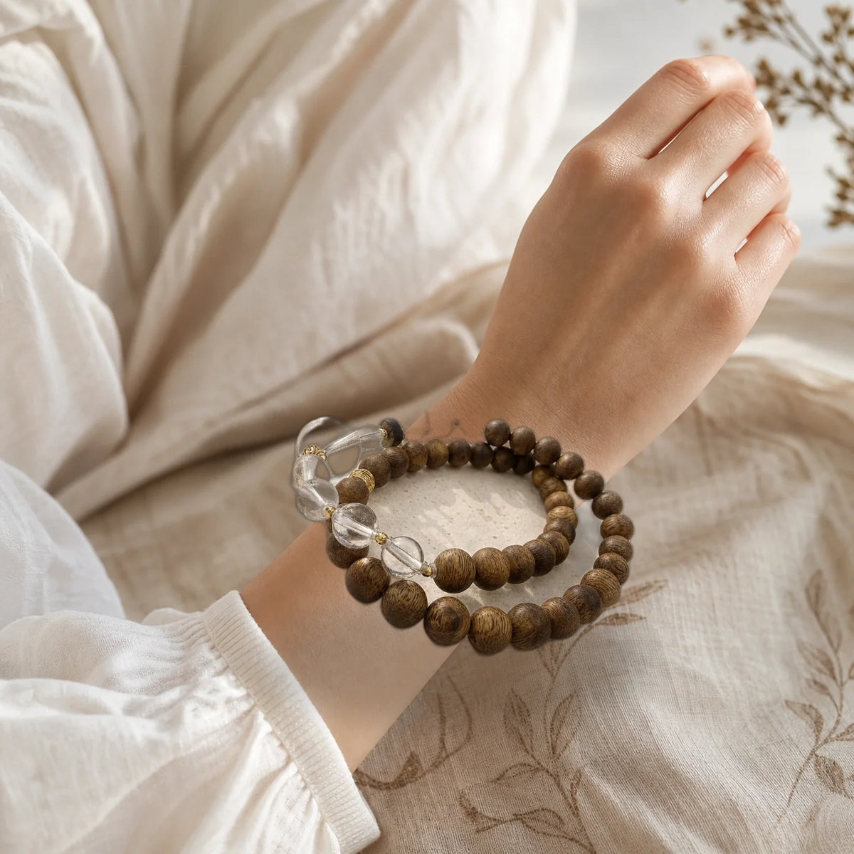 Kynam agarwood clear quartz bracelet worn on wrist