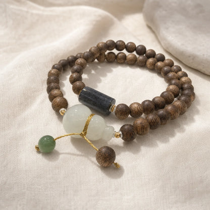 Kynam Agarwood Hetian Jade Gourd Bracelet for Prosperity - WhisperVow standard product photo