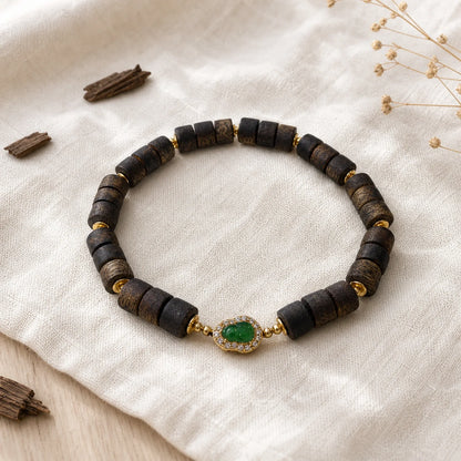 Kynam agarwood jade barrel bead bracelet front view