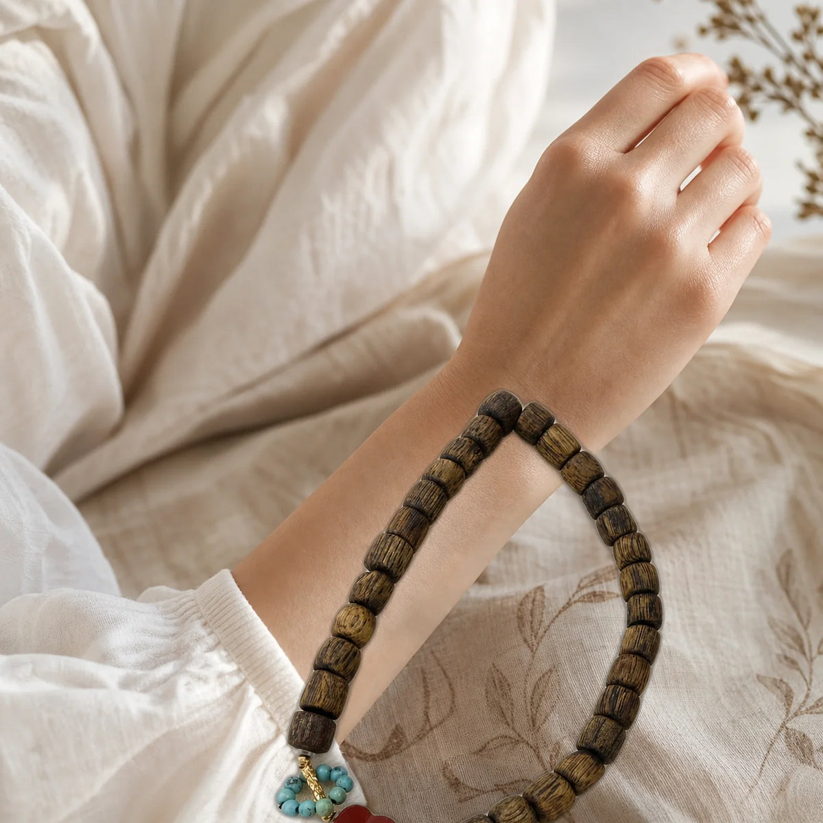 Kynam agarwood red heart turquoise bracelet worn on wrist