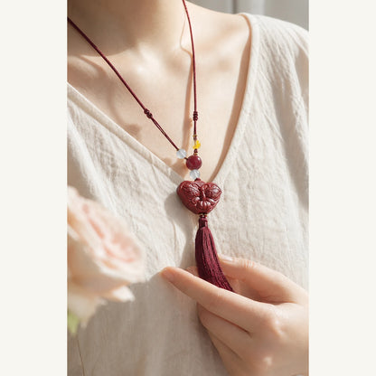 Rose Scent Butterfly Incense Pendant Charm worn as a necklace