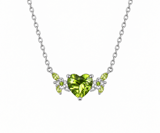 Sterling silver botanical station necklace with a heart-cut green peridot