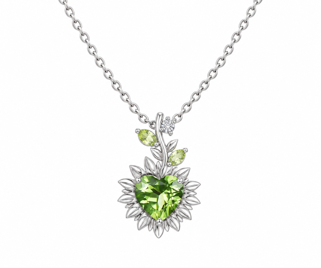 Sterling silver floral pendant necklace with a heart-cut green peridot