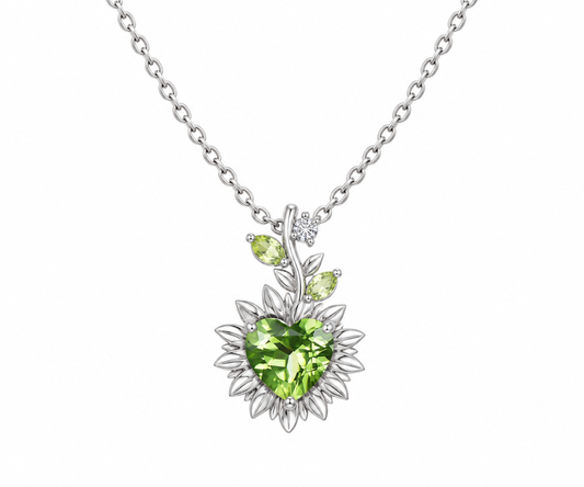Sterling silver floral pendant necklace with a heart-cut green peridot